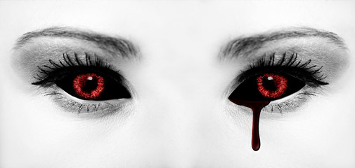 Evil black alien vampire or zombie eyes. Close up shot - obrazy, fototapety, plakaty