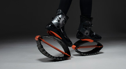 Fit legs in kangoo jumping shoes.