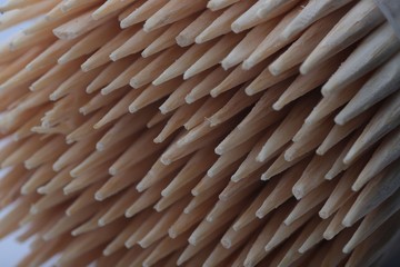 A toothpick in a dozen on a white background