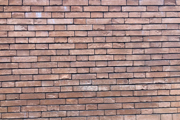 Old red brick wall background close-up. Copy space. Industrial.