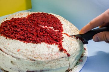 Red velvet cake with a heart on top of it 