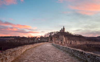 Beautiful panoramic view of medieval Tsarevets fortress in Veliko Tarnovo, Bulgaria during sunrise in the morning. the famous historical capital. Panorama. Patriarch Church on the Tsarevets hill