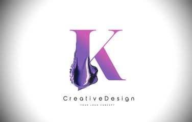 K Letter Design Brush Paint Stroke. Purple k Letter Logo Icon with Violet Paintbrush