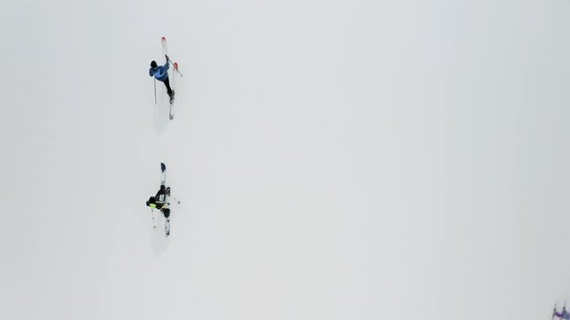 Two man skitouring at the Shymbulak mountain resort, Almaty, Kazakhstan. Aerial.