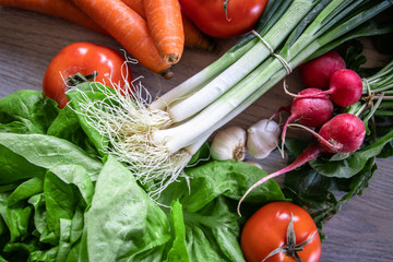 Fresh organic vegetables on kitchen table