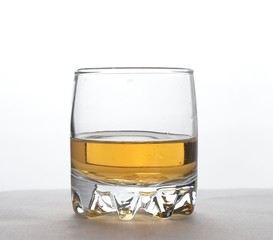 glass of whiskey on white background 