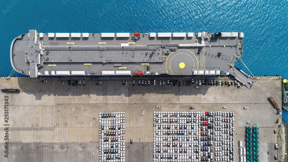 Wall mural aerial top view large roro (roll on/off) car or vehicle carrier vessel loading car for shipping to w