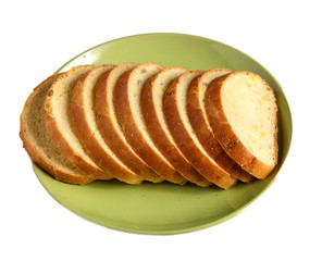 Wheat bread slices on a plate on a white background.