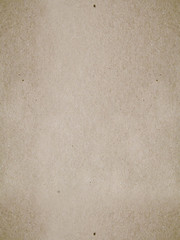 Brown Kraft surface, seamless texture. Dark beige textured cardboard binding background, old...