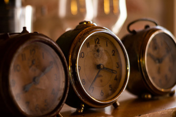 Three ancient clocks. Machinery to mark the passage of time.