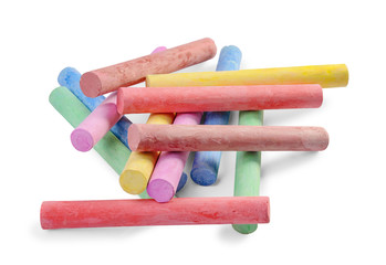 Pile of colored chalks isolated on white background