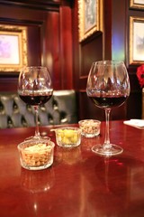 Wine glasses in a restaurant setting.