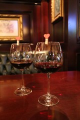 Wine glasses in a restaurant setting.