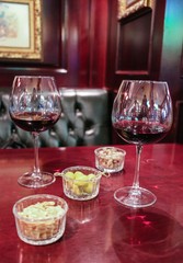 Wine glasses in a restaurant setting.