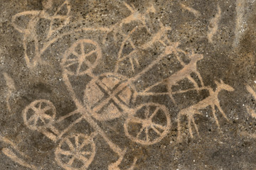 Image of ancient people on the wall of the cave. history of antiquities, archaeology.