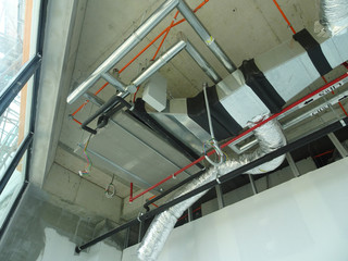 Air-condition and ventilation duct under construction at the construction site. Distributing cool air and control the rooms temperature.  