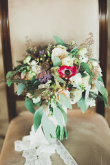 Wonderful luxury wedding bouquet of different flowers