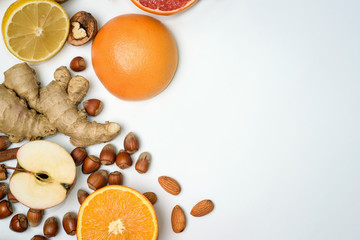 group of raw orange fruit on white background