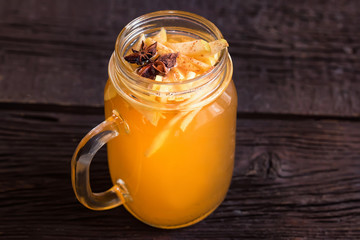 Close up glass jar with delicious healthy apple punch