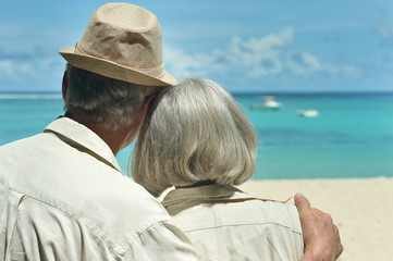 Fototapeta na wymiar Portrait of elderly couple rest at tropical resort