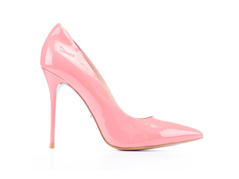 Pastel pink woman shoes isolated on the whit