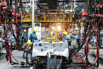 Welding robots movement in a car factory