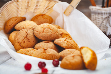 Homemade tangerine cookies on wooden rustic table. Close up