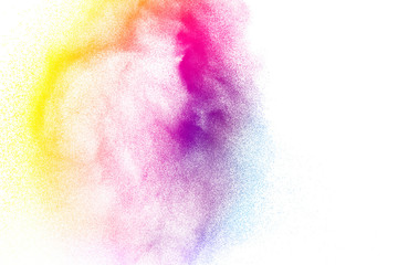 Abstract color powder explosion on white background.Freeze motion of dust splash. Painted Holi in festival.