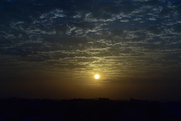 dramatic sky with clouds and sun