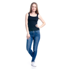 Obraz premium Woman in jeans and black shirt standing smiling on white background isolation