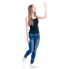 Woman in jeans waving hand smiling on white background isolation