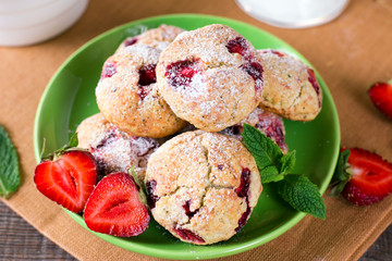 Homemade cookies with strawberries and icing sugar
