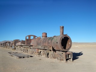 Fototapeta na wymiar Rusty Old train from the train cemetery, in Uyuni, Bolivia.