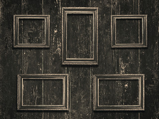 Old wooden frames on vintage  wooden background