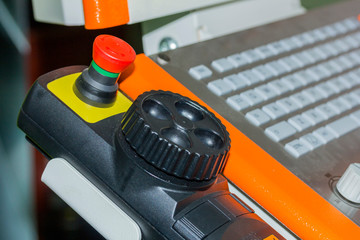 close up control panel of cnc machining center at workshop