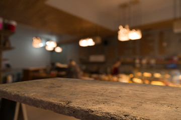 blurred background of bar and dark brown desk space of retro wood