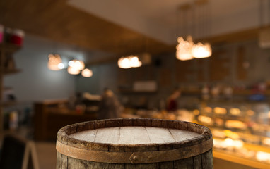 blurred background of bar and dark brown desk space of retro wood