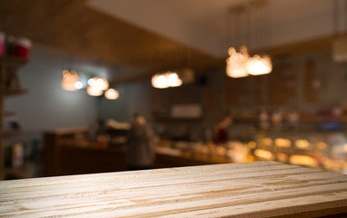 blurred background of bar and dark brown desk space of retro wood