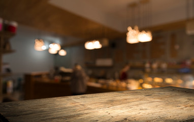 blurred background of bar and dark brown desk space of retro wood