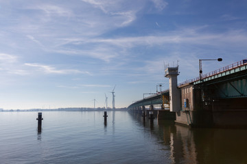 Fototapeta na wymiar haringvliet bridge in the netherlands. Part of the Dutch Delta Works and the largest inland water locks in Europe