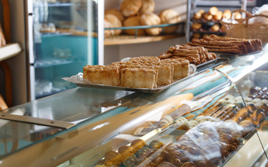 Various baked sweet cookies on bakery showcase