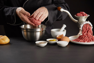 Man making meat balls for dog