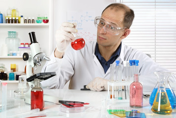 A young scientist conducting experiments with chemical reagents