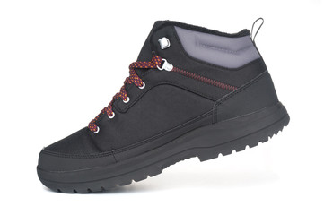 Black winter boot close up on white background