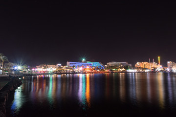Fototapeta na wymiar Night view of hotels in israel vacation resort Eilat, Israel.