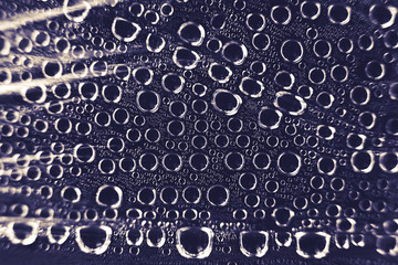 Condensate. Drops of water on a transparent film. Black and white. Backround. 