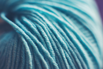 Macro blue ball of yarn. Fibers. Background. Blur