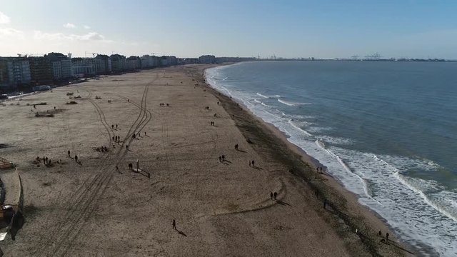 Aerial view of beach of Knokke-Heist is municipality in the Belgian province of West Flanders and is located along the North Sea in a polder area and is best-known and most affluent seaside resort 4k