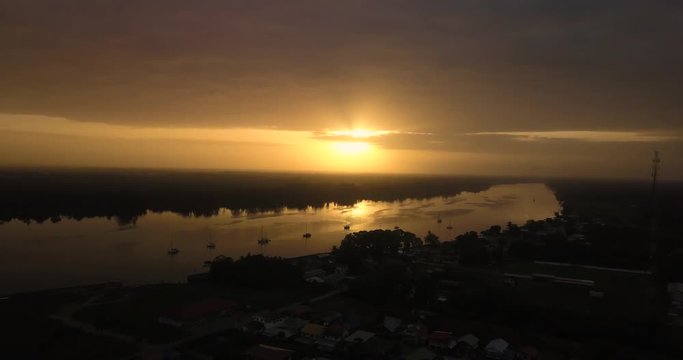 Sunrise on/by the river on the countryside in Domburg, Suriname (South America) shot on a dji mavic pro