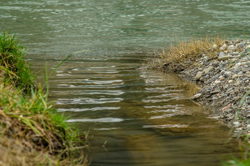 Fototapeta na wymiar River into the lake.